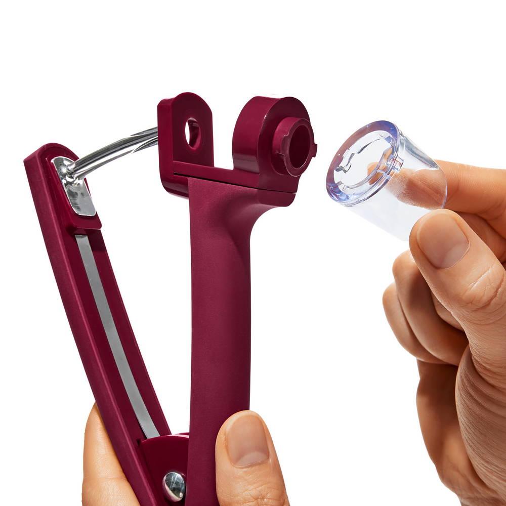 Vypeckovávač třešní a oliv Good Grips, červený